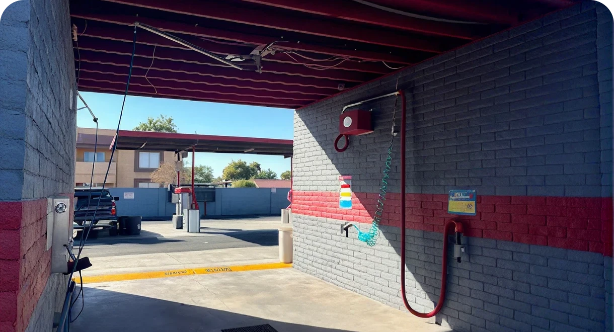 Car wash station with hoses and equipment